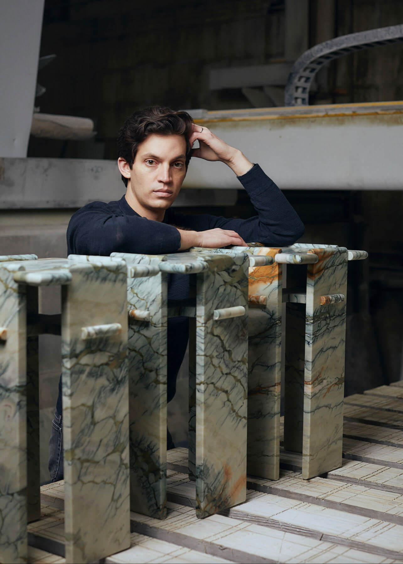 Matthew Fisher with 'Side Table 22' (Desert Green), 2021 COURTESY: Matthew Fisher