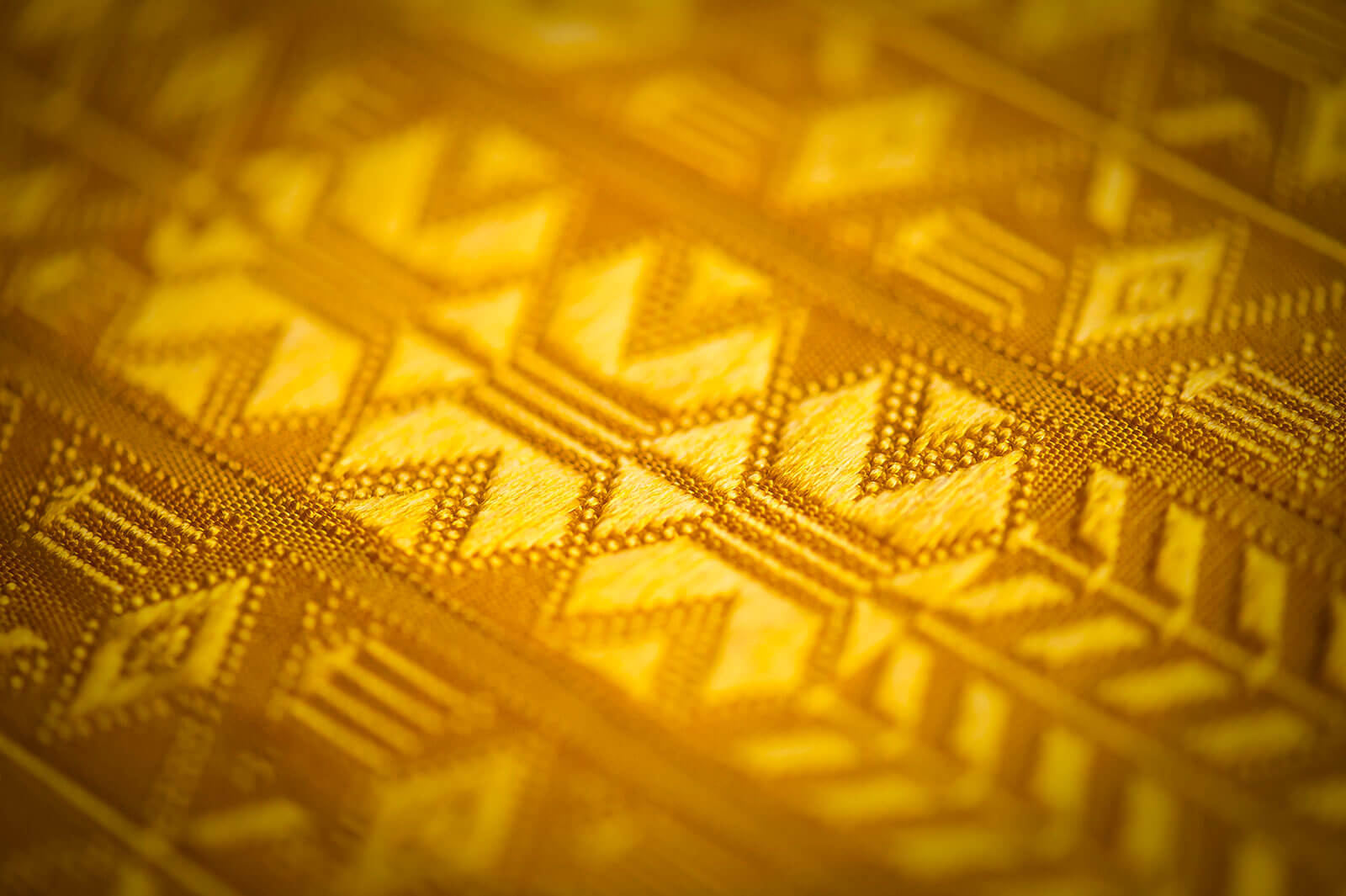 Detail of woven geometric motifs in the brocaded weave lamba COURTESY: Simon Peers, Nicholas Godley and Oliver Hoare