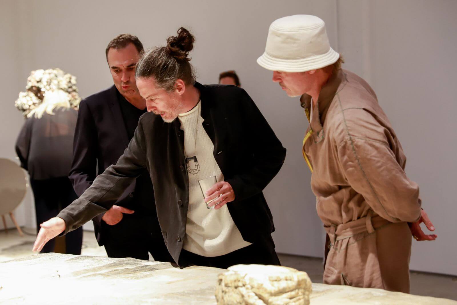 (Left to right) Löic Le Gaillard, Nacho Carbonell, Brad Pitt at ‘Nacho Carbonell’, Carpenters Workshop Gallery, LA COURTESY: Nacho Carbonell & Carpenters Workshop Gallery / PHOTOGRAPH: River Callaway © BFA.com
