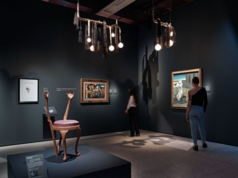 Exhibition view, ‘Objects of Desire’ at The Design Museum, London, with Salvador Dalí and Edward James, ‘Cat’s Cradle Hands Chair’, circa 1936; Jonathan Trayte, ‘Luna Camel 1&2’, 2022 COURTESY: The Design Museum / PHOTOGRAPH: Andy Stagg
