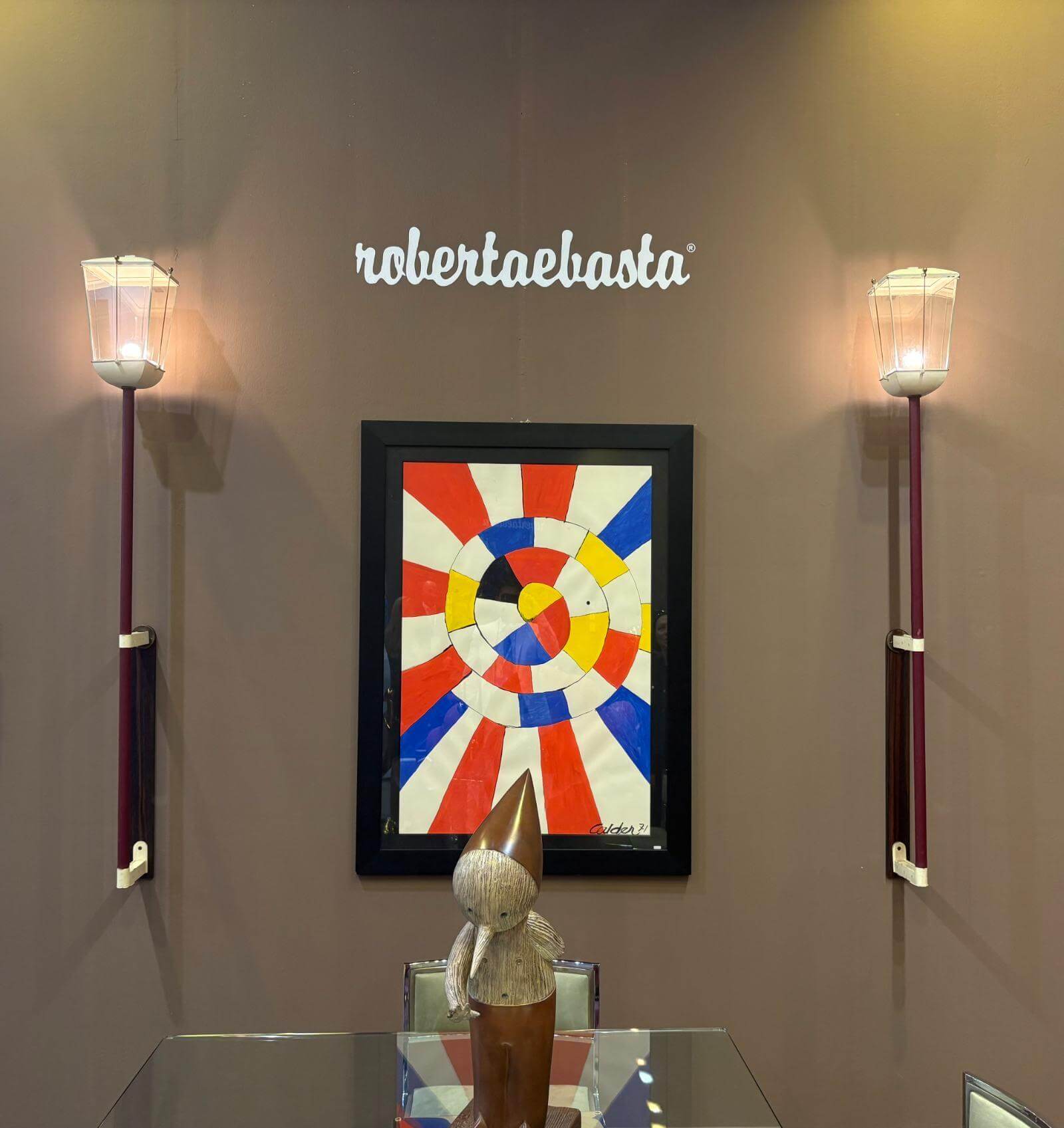 Installation view Roberaebasta, miart 2026, with Paul Dupré Lafon pair of wall lamps in leather, metal and glass, 1952