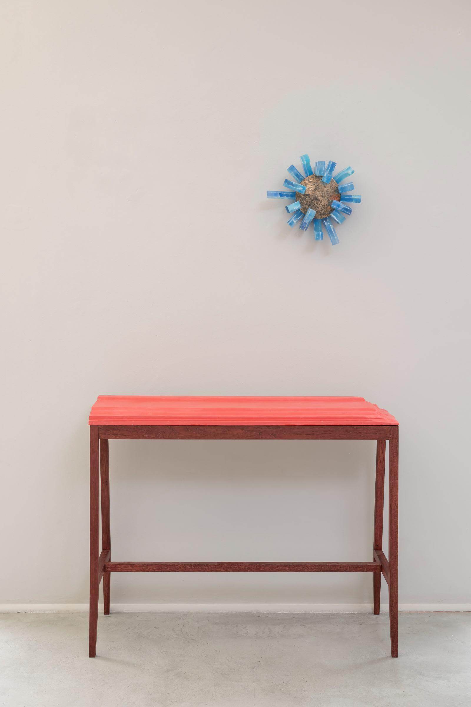 Exhibition view, ‘By Which We Live’ with: Glithero, ‘Bench Mould Rail Console’, 2026; Jie Wu, ‘Blooming No. 3’, 2024 COURTESY: Gallery FUMI / PHOTOGRAPH: Penguins Egg Studio