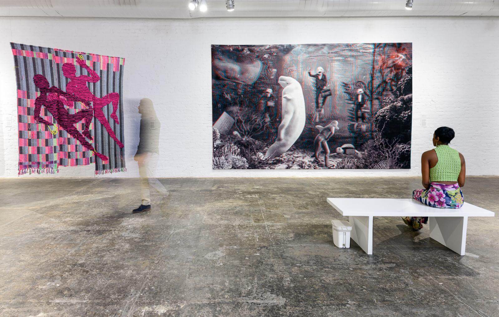 Exhibition view ‘You Stretched Diagonally Across It’ with (right) Goshka Macuga, ‘Who Gave Us a Sponge to Erase the Horizon?’, 2022; (left) Diedrick Brackens, ‘nuclear lovers’, 2020 COURTESY: © The Artists and The Fabric Workshop and Museum / PHOTOGRAPH: Constance Mensh