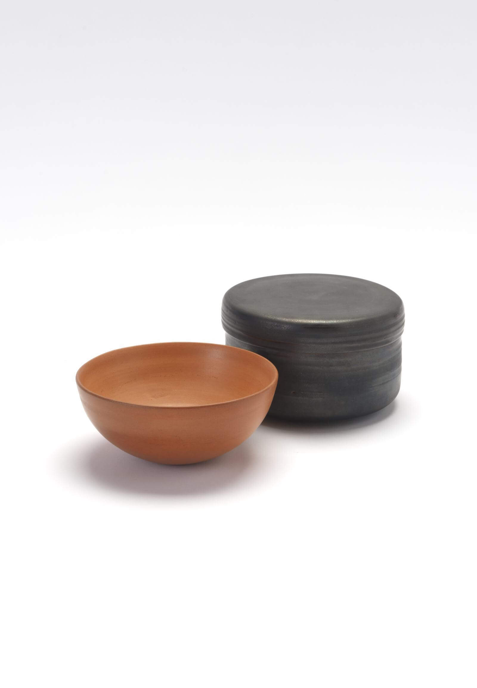 Lucie Rie, ‘Early London period bowl’, circa 1945; Lucie Rie & Hans Coper, ‘Early London period cylindrical lidded pot’, circa 1947 COURTESY: © Estate of the artists/The Lucie Rie and Hans Coper Foundation
